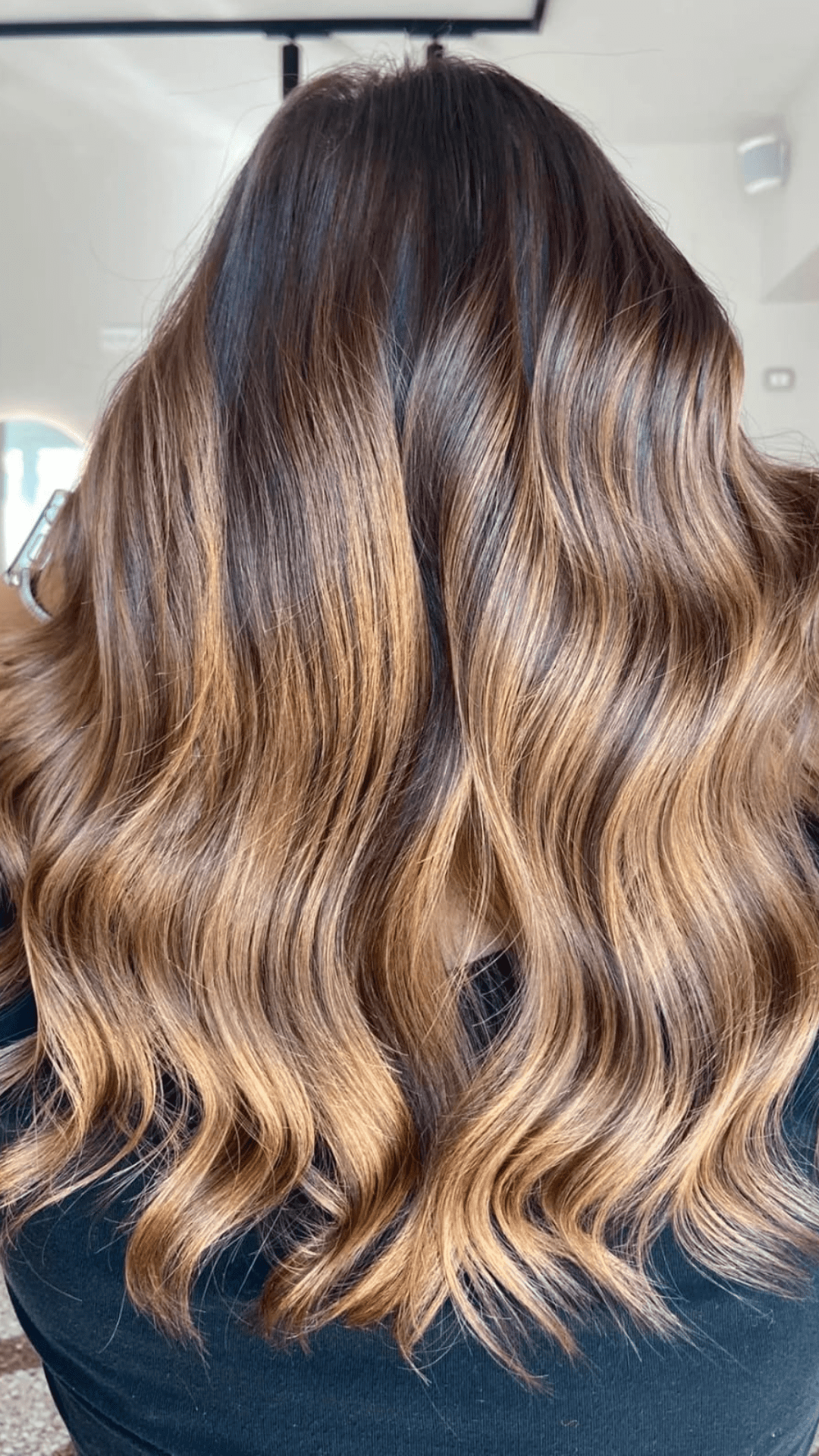 Degradé Conseil su capelli castani realizzato ad Atelier CDC Genova